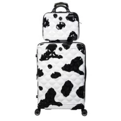 IT Luggage Indulging - 4pc Set (Moo Cow Print) -Travel Luggage Store 33198 UK16 3039A08 16 3039A15Moocowblack whiterepeatprintSSFrontpanel25in